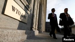 A scene just outside the doors of the World Trade Organization headquarters in Geneva.